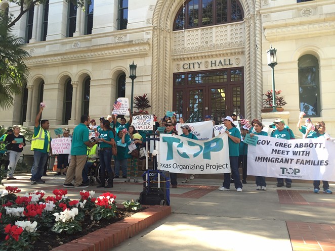 Members of the Texas Organizing Project gather outside of city hall during an immigration rally last year. - TEXAS ORGANIZING PROJECT