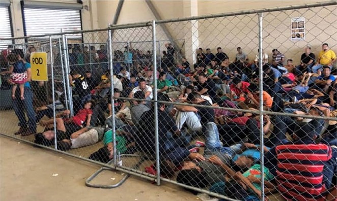 Families huddle together in an overcrowded cell at the Border Patrol’s station in McAllen. - Department of Homeland Security Office of the Inspector General