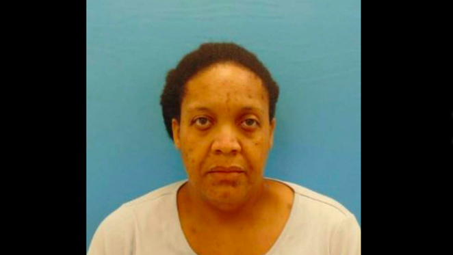Delissa Crayton, charged with second degree felony injury to a child after exposing her daughter to her mother's corpse for three years. - Seguin Police Department
