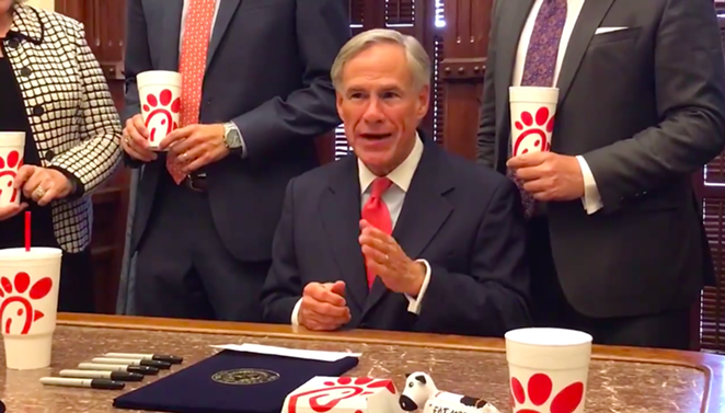 Gov. Greg Abbott makes a point about religious freedom with Chick-fil-A cups carefully arranged in the shot. - Twitter / @GregAbbott_TX