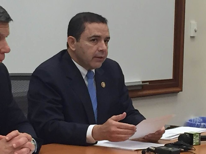 Henry Cuellar speaks to reporters at a press conference on Monday. - SANFORD NOWLIN