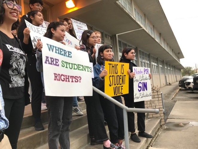 Student activists from SAISD display signs asking for more involvement in setting district policies. - COURTESY PHOTO / ALEX BIRNEL