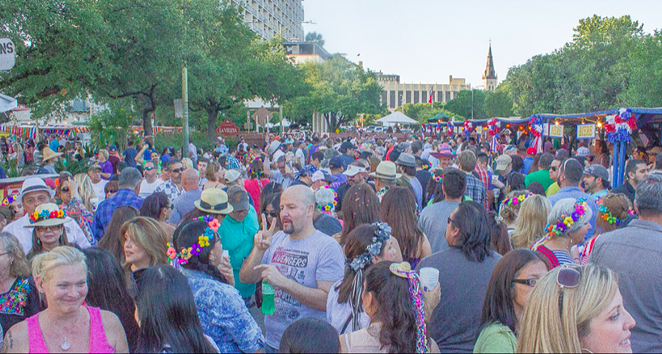 Revelers flood the popular Night in Old San Antonio Event during a past Fiesta. - BK MKEE