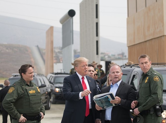 President Donald Trump reviews U.S. Customs and Border Protection's wall prototypes in Otay Mesa, California, last year. - Wikimedia Commons / U.S. White House