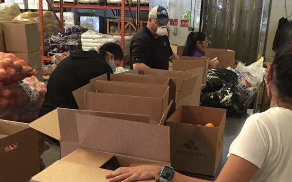 Controversial Events Firm Delivers 235 Boxes To San Antonio Food Bank. Only 749,765 To Go!