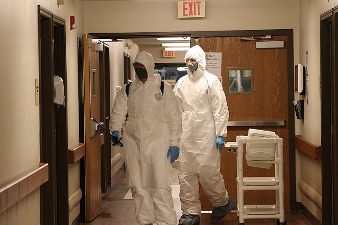 Members of the Texas Army National Guard clean and disinfect nursing home surfaces after a COVID-19 outbreak. - WIKIMEDIA COMMONS / NATIONAL GUARD