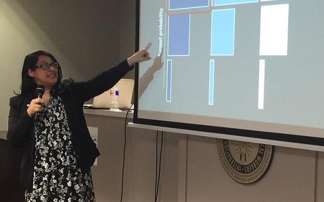 Jenn Longoria shows off campaign volunteer data during a presentation. - INSTAGRAM / JENN LONGORIA