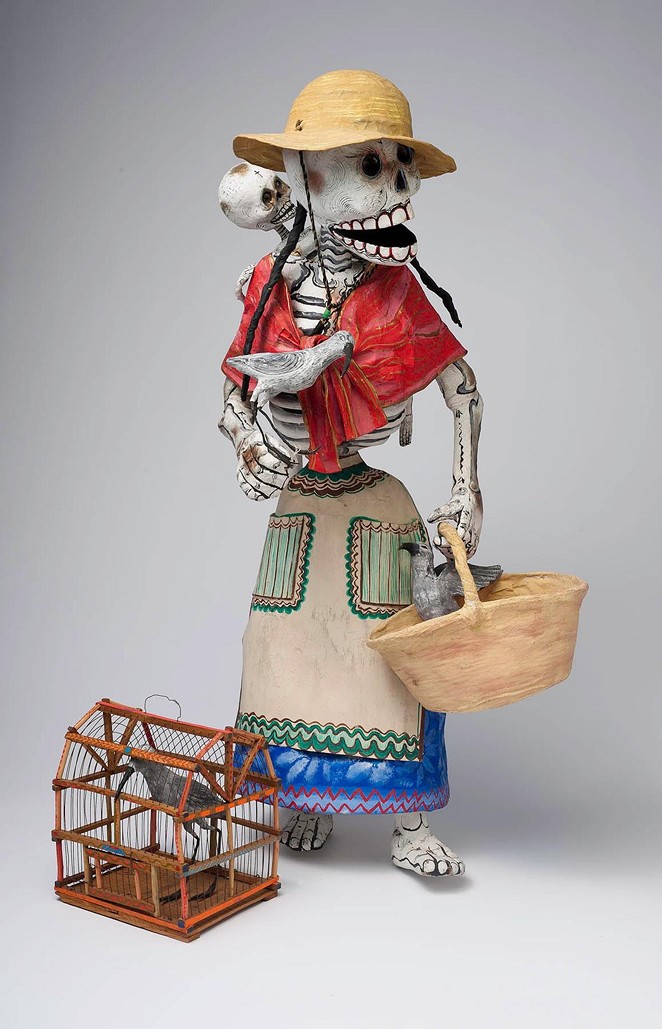 Miguel Linares, Skeleton Street Vendor, Mexico, ca. 1965 , Papier-mâché, paint, wire, and cord,The Nelson A. Rockefeller Mexican Folk Art Collection, 85.98.591 - COURTESY OF SAN ANTONIO MUSEUM OF ART
