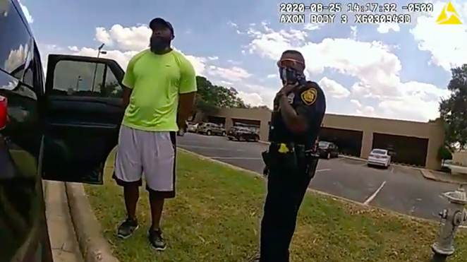Body cam footage shows officers detaining jogger Mathias Ometu last week. - YouTube / San Antonio Police Department