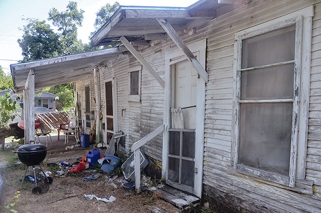 Margaret Crain and son Robert share this home, which could use some fixing. - MICHAEL MARKS