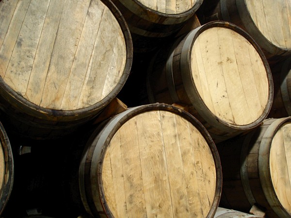 Tequila barrels full of delicious tequila. Smiley face. - WIKIMEDIA