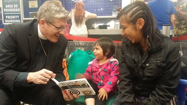 Immigration officials dropped this woman and her child off at a Greyhound station last March. RAICES visited the facility with this clergy member to hand care backpacks to mothers and children heading to all corners of the country after being released from detention facilities. - RAICES | FACEBOOK