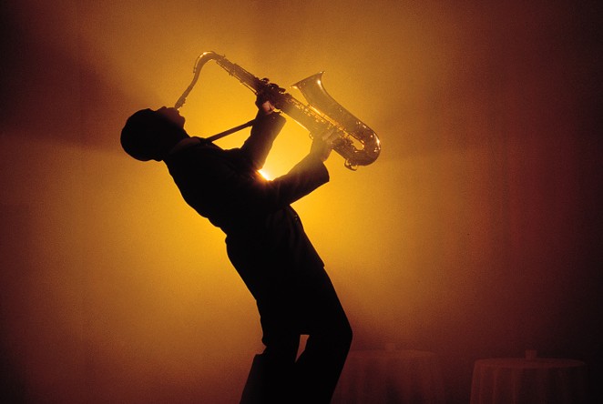 Man playing Saxophone - Courtesy
