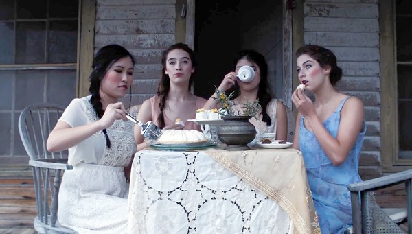 Actresses Ashley Drengler, Becca Brown, Rachel Miller and Jasmine Liu-Zarzuela sip tea and eat sweets in Lady of Paint Creek. - COURTESY