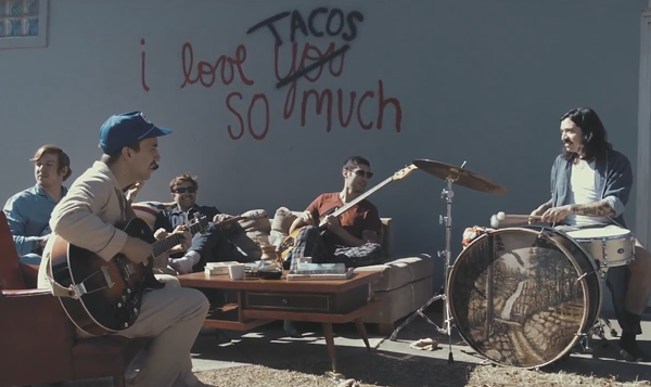 El Campo at the "I Love You Tacos So Much" wall. - YOUTUBE