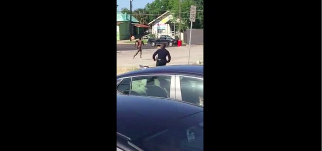A naked man runs from police near San Pedro Avenue. - SCREENSHOT/VID.ME USER MIRAI182