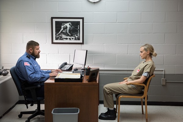 Piper wields her white privilege with Capt. Piscatella. - COURTESY OF NETFLIX