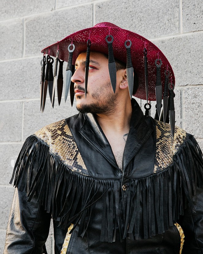 El Paso-based photographer Jeanette Nevarez captured Villalobos in a hat he hopes to use in a future performance. - JEANETTE NEVAREZ