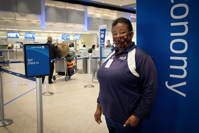 Monique Warren works as a baggage handler at George Bush Intercontinental Airport in Houston. Warren earns $9 per hour, and is a supporter of President Joe Biden's proposal to raise the minimum wage to $15 an hour. - May-Ying Lam / The Texas Tribune