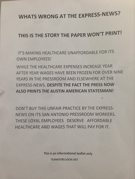 Press workers at the Express-News handed out this flier around the daily's downtown building Wednesday morning