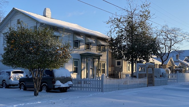 Snow blankets a neighborhood north of downtown San Antonio. - SANFORD NOWLIN
