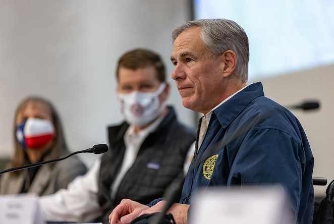 Gov. Greg Abbott speaks at a press conference regarding Texas’ emergency response to an unprecedented winter storm gripping Texas on Feb. 13, 2021. Abbott himself might not have been paying close attention to electricity and water and gas a couple of weeks ago, but the people who are paid to pay attention report to him. Credit: - JORDAN VONDERHAAR / THE TEXAS TRIBUNE