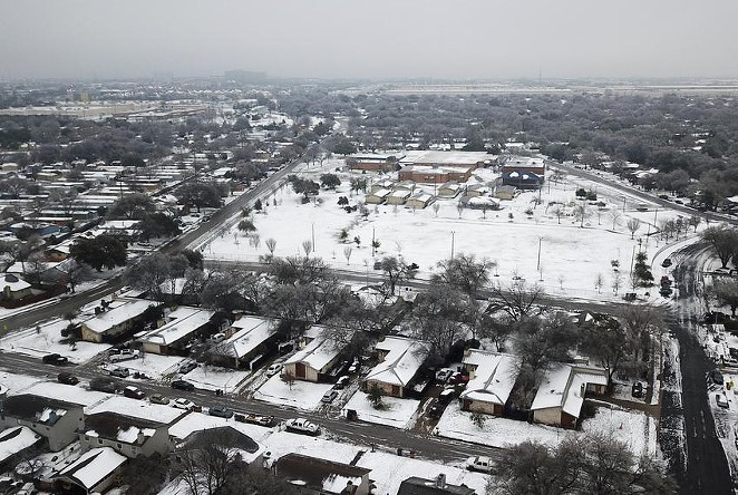 A severe snowstorm dumped heavy snow across the state last month, including on the Dove Springs neighborhood in South Austin. - MIGUEL GUTIERREZ JR. / THE TEXAS TRIBUNE