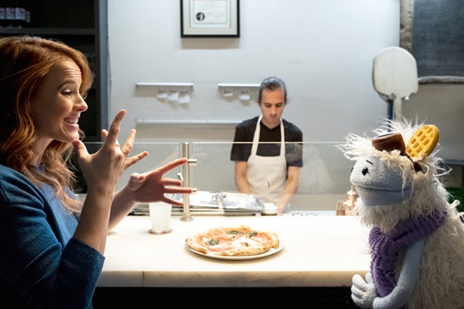 Katie Leclerc shares a scene with the show's titular puppet Waffles. - NETFLIX