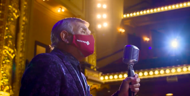 Tejano singer Little Joe delivers his message with a mask on. - YOUTUBE SCREEN CAPTURE / CITY OF SAN ANTONIO