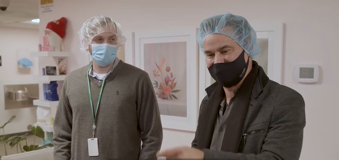 State Sen. Roland Gutierrez (right) tours a marijuana products facility in Colorado in his new, self-financed documentary. - SCREEN CAPTURE / LEGALIZE TEXAS YOUTUBE CHANNEL