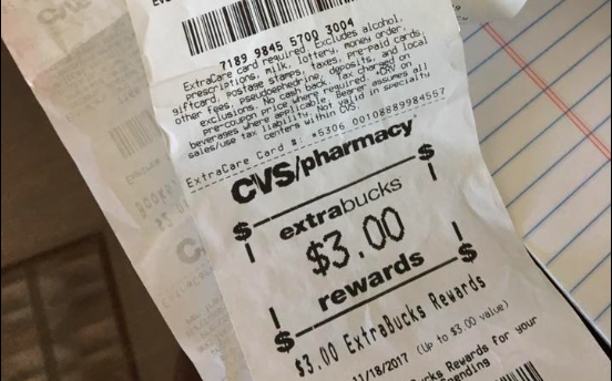 This mile-long CVS receipt dug from a Health and Human Services Commission employee's desk drawer will be given to a lucky Texan without health coverage. - FACEBOOK / RONNIE DAHL