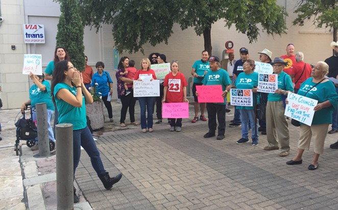 Activist Joleen Garcia leads paid sick time advocates outside the chambers of San Antonio City Council. Council voted to approve the ordinance in 2018, but it's been contested in court. - SANFORD NOWLIN