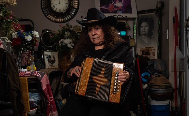 San Antonio: Eva Ybarra, the Accordion Queen, poses for a portrait. After years without broad recognition, she is finally getting her due. - Texas Observer / Ivan Armando Flores