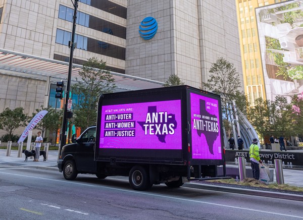 Activist group UltraViolet circles AT&T’s Dallas headquarters with a mobile billboard calling out its political spending. - COURTESY PHOTO / ULTRAVIOLET