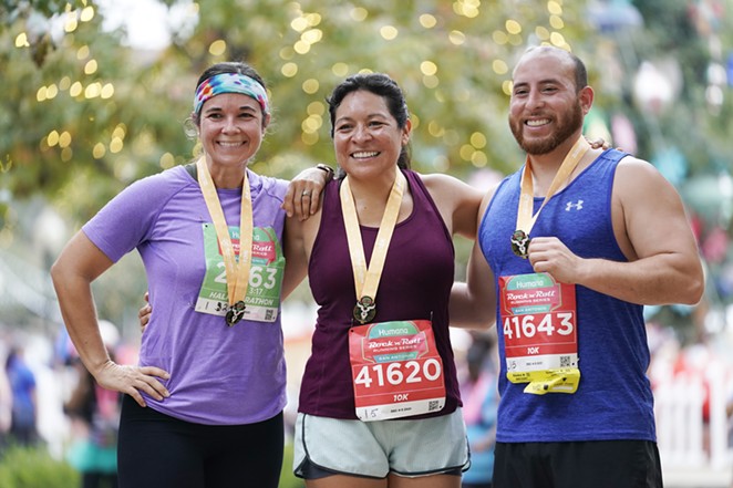 Athletes celebrate after competing in the 5k and 10k during the Rock ’n’ Roll Marathon San Antonio on Dec. 4. - PATRICK MCDERMOTT FOR ROCK ‘N’ ROLL RUNNING SERIES