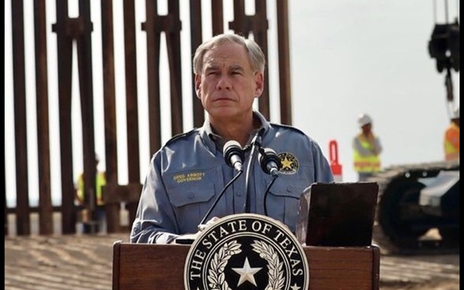 Gov. Greg Abbott puts on his best scowl and faux-military shirt at a photo-op showing off 900 feet of state-funded border wall. - INSTAGRAM / GOVERNORABBOTT