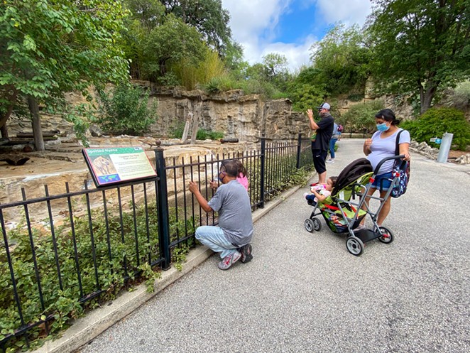 Visitors check out a habitat at the San Antonio Zoo. - COURTESY OF SAN ANTONIO ZOO