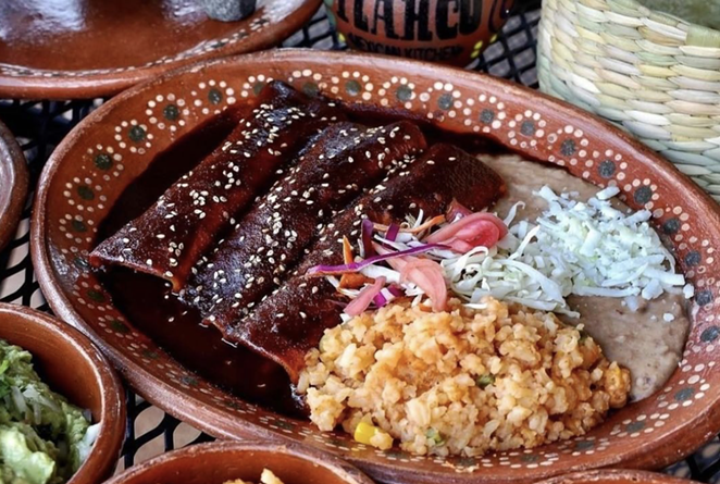 Tlahco Mexican Kitchen's popular chicken mole enchiladas will be served at the new location. - INSTAGRAM / TLAHCO.MK