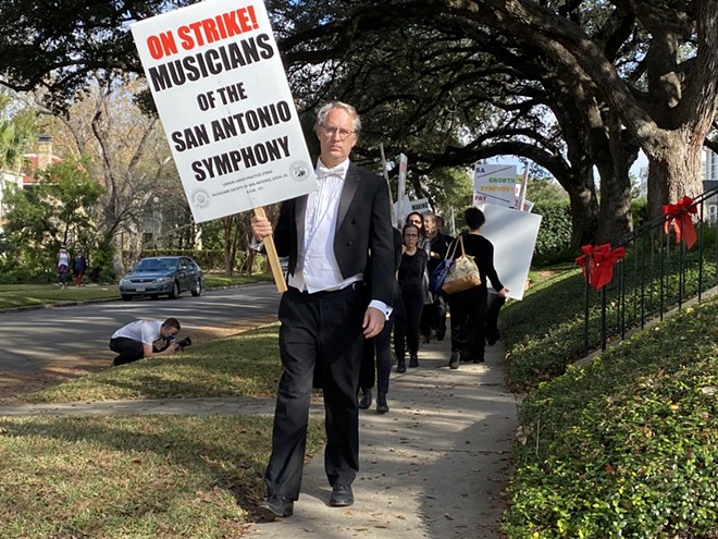 Musicians from the San Antonio Symphony picket the home of Kathleen Weir Vale, the organization’s chair. They staged the protest in late December. - Sanford Nowlin