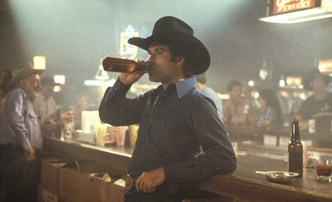 John Travolta in Urban Cowboy . - Paramount Pictures