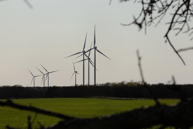 Wind turbines in Central Texas on March 25, 2021. As state leaders push to make the state's power grid more reliable, there hasn't been an equal push to reduce greenhouse gas emissions from the Texas power sector. - TEXAS TRIBUNE / EVAN L'ROY