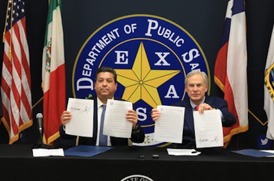 Gov. Greg Abbott and Tamaulipas Gov. Francisco García Cabeza de Vaca show off a signed memo pledging better security measures. The agreement didn't call for the Mexican state to implement new policies, according to reports. - COURTESY PHOTO / TEXAS GOVERNOR'S OFFICE