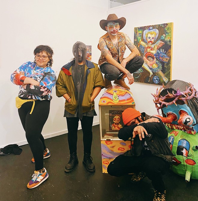 Ursula Zavala (far left) with gallery-goer Josh, featured artist Mauro de la Tierra, and her partner Edward Perez. - URSULA ZAVALA