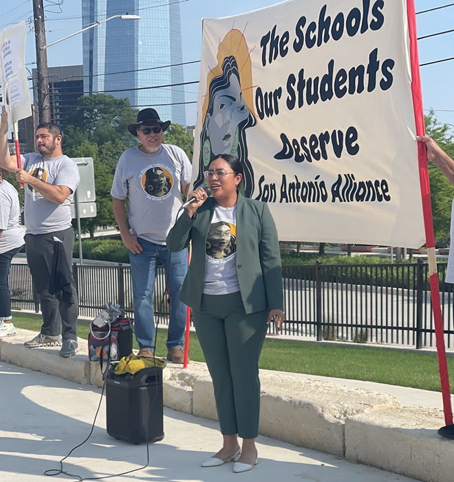 Congressional candidate Jessica Cisneros spoke to teachers and community members during a rally outside San Antonio ISD headquarters Monday. - Michael Karlis