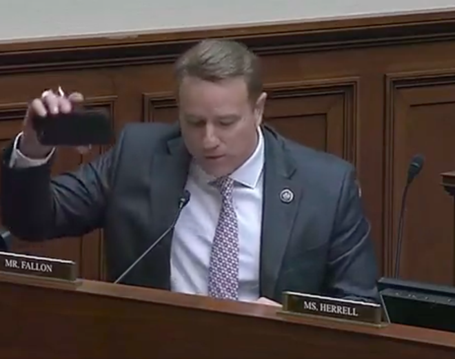 U.S. Rep. Pat Fallon holds up a "dang smartphone" to show why the world is going to hell in a handbasket. - Screen Capture / U.S. House
