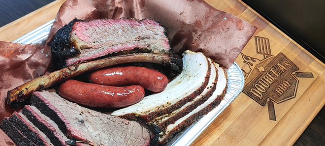 Double A BBQ uses a mix of pecan, mesquite and post oak wood chips on its meats. - FACEBOOK / DOUBLE A BARBECUE
