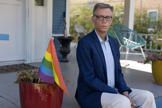Dale Carpenter, outside his home in Dallas on July 8, was the state president of the Log Cabin Republicans in the 1990s but has since distanced himself from party politics. The group is the largest organization representing gay conservatives and advocating for inclusivity in the GOP. - Texas Tribune / Shelby Tauber