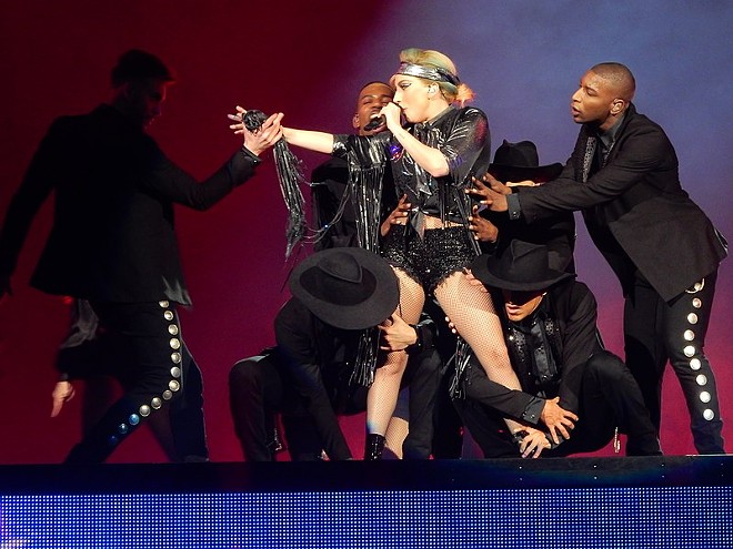 Lady Gaga performing at Arena Birmingham as part of a 2018 tour. - Wikipedia Commons / Steve Baker