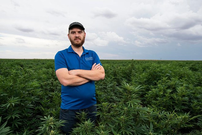 Kyle Bingham, who grows hemp at Bingham Family Vineyards, on Aug. 29, 2022, in Terry County. Though Bingham has had some success with the hemp crops he’s planted, he said he quickly learned that hemp was not drought tolerant. - Texas Tribune / Justin Rex