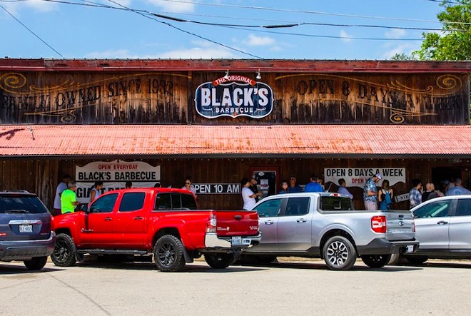 Customers line up outside the original Black's Barbecue in Lockhart. - Instagram / blacksbbq